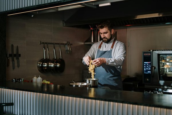 How do UK kitchen bars ensure compliance with health regulations?